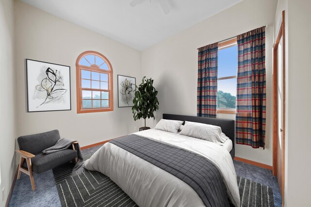 carpeted bedroom featuring ceiling fan