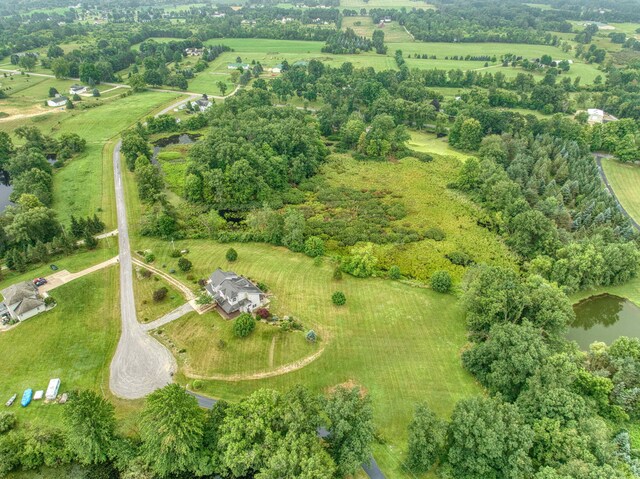 aerial view featuring a water view and a rural view