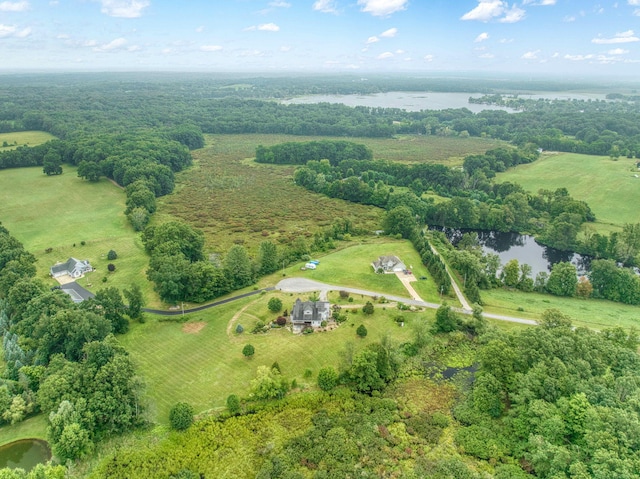 drone / aerial view featuring a rural view and a water view