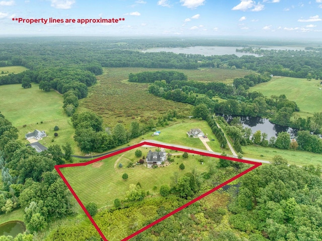 aerial view featuring a water view and a rural view