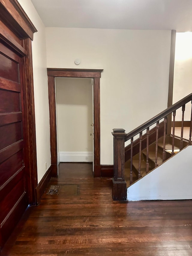 hall featuring dark hardwood / wood-style floors