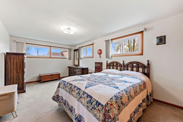 bedroom with light carpet