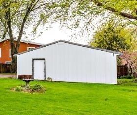 view of outdoor structure with a yard