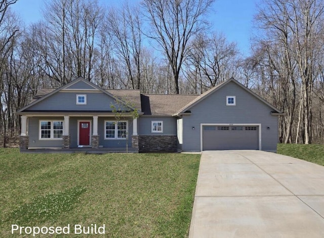 view of front facade with a front yard and a garage