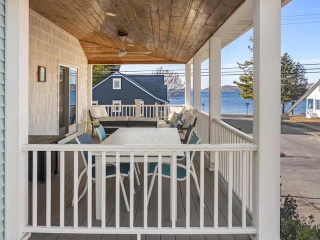 87 S Center St, Beulah, MI 49617 - view of patio / terrace featuring a water view and a ceiling fan