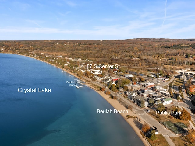 87 S Center St, Beulah, MI 49617 - aerial view of property's location with a nearby body of water