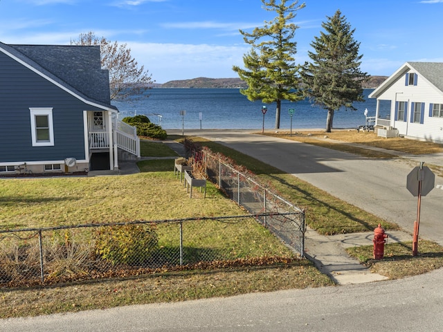 87 S Center St, Beulah, MI 49617 - view of yard featuring a water view