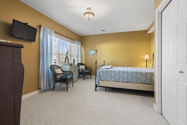 87 S Center St, Beulah, MI 49617 - carpeted bedroom with baseboards