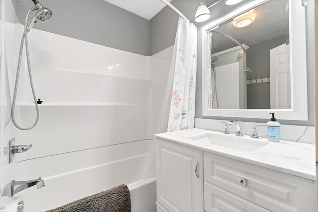 87 S Center St, Beulah, MI 49617 - bathroom featuring shower / tub combo and vanity