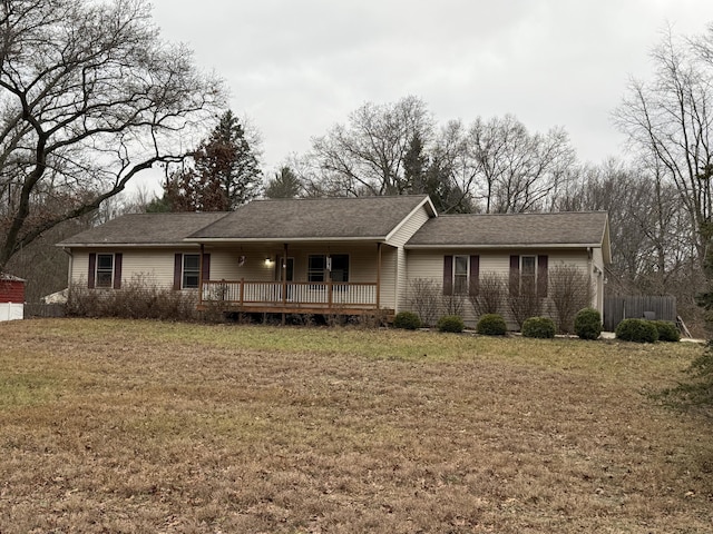 single story home featuring a front yard