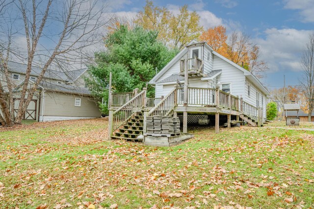 1820 River Bluff Rd, Niles, MI 49120 - rear view of property with stairs, a deck, a lawn, and an outbuilding