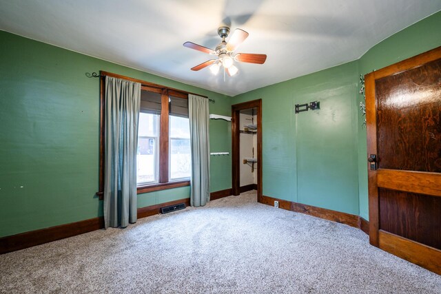 1820 River Bluff Rd, Niles, MI 49120 - empty room featuring a ceiling fan, carpet flooring, and baseboards
