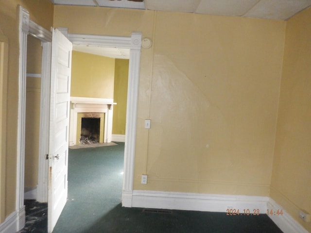 unfurnished room with carpet flooring