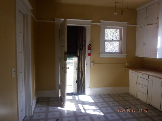 kitchen with white cabinetry