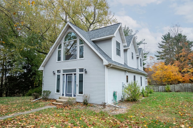 view of front of home with a front yard