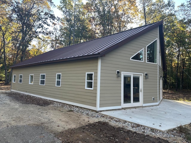 rear view of property with a patio area