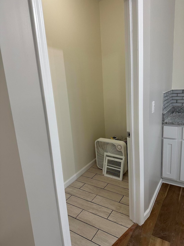 bathroom featuring vanity and wood-type flooring