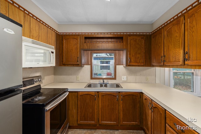 kitchen featuring appliances with stainless steel finishes and sink