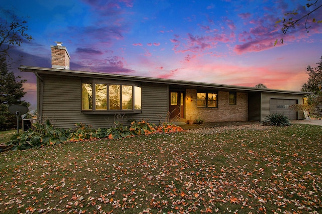 single story home featuring a garage