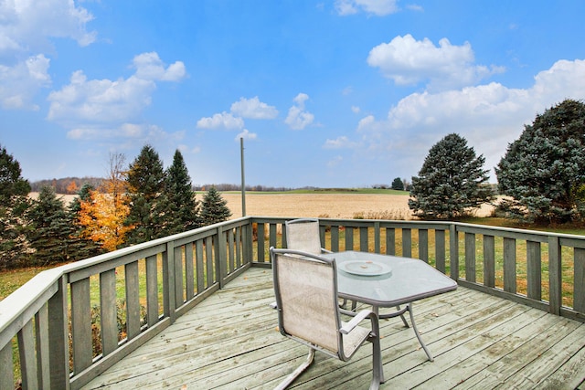 wooden terrace with a rural view