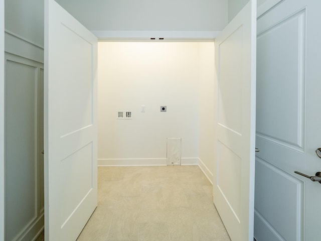 laundry room with hookup for an electric dryer, hookup for a washing machine, and light carpet