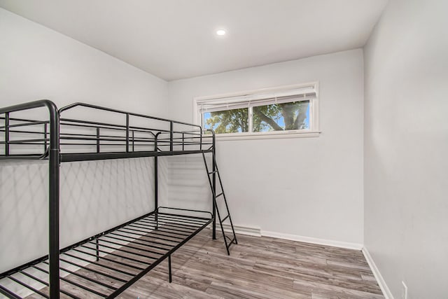 bedroom featuring hardwood / wood-style floors