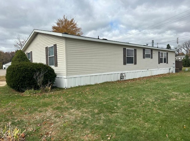 view of property exterior featuring a yard