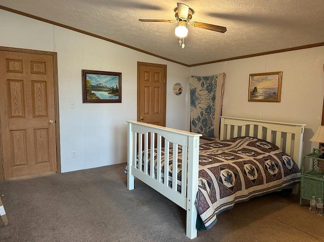 carpeted bedroom with ornamental molding, a textured ceiling, vaulted ceiling, and ceiling fan