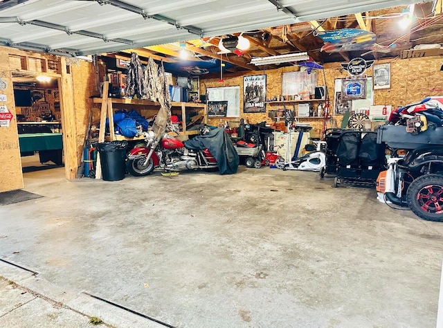 garage with a workshop area