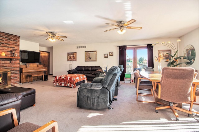 living room with ceiling fan and carpet floors