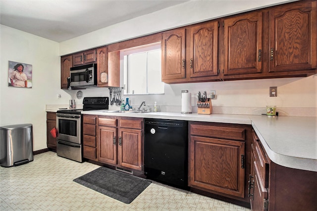 kitchen featuring sink and appliances with stainless steel finishes