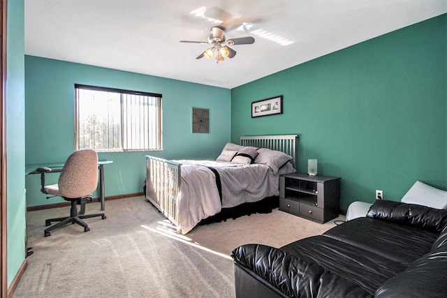 bedroom with light colored carpet and ceiling fan