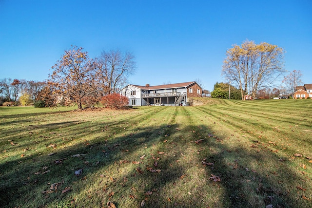 view of yard featuring a deck