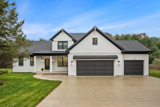 modern farmhouse with a front lawn