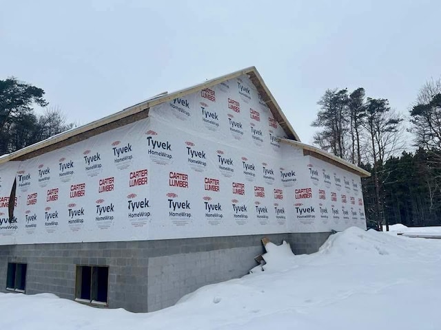 view of snow covered property