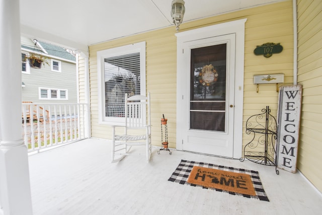 entrance to property with covered porch