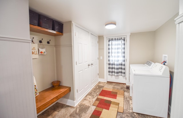 washroom with independent washer and dryer