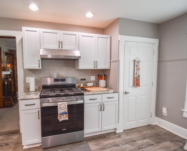 kitchen featuring white cabinets, dark hardwood / wood-style floors, and gas stove