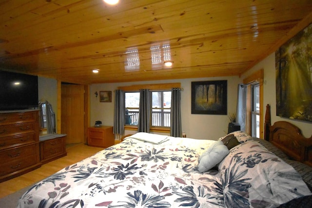 bedroom featuring light wood-type flooring and wood ceiling