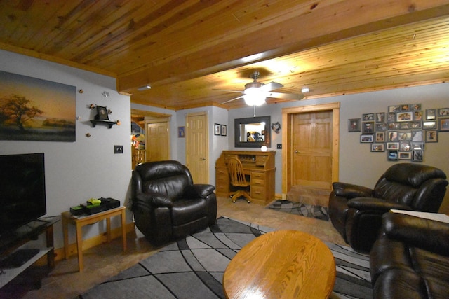 carpeted living room with ceiling fan and wooden ceiling