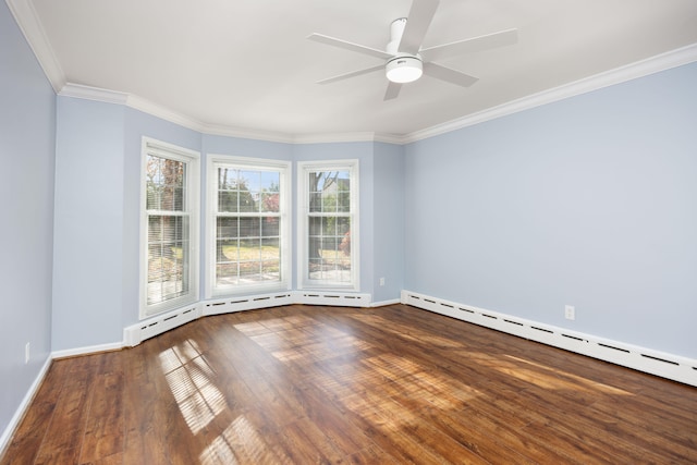 spare room featuring hardwood / wood-style flooring, ceiling fan, a baseboard radiator, and crown molding