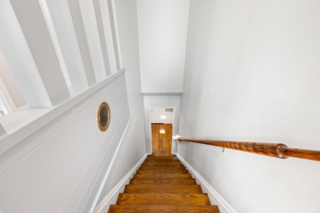 stairway featuring hardwood / wood-style flooring