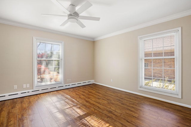 spare room featuring hardwood / wood-style floors, ceiling fan, a healthy amount of sunlight, and a baseboard radiator