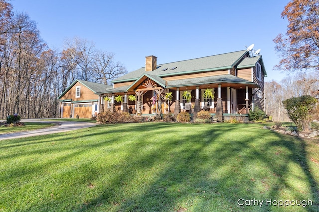 view of front of property with a front yard and a porch