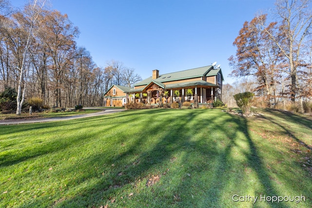 view of front of house with a front lawn and a porch