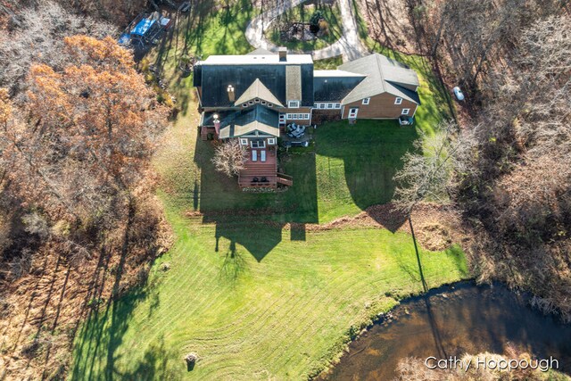 birds eye view of property with a rural view