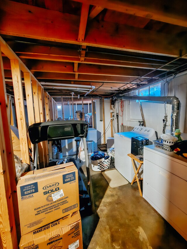 basement with separate washer and dryer