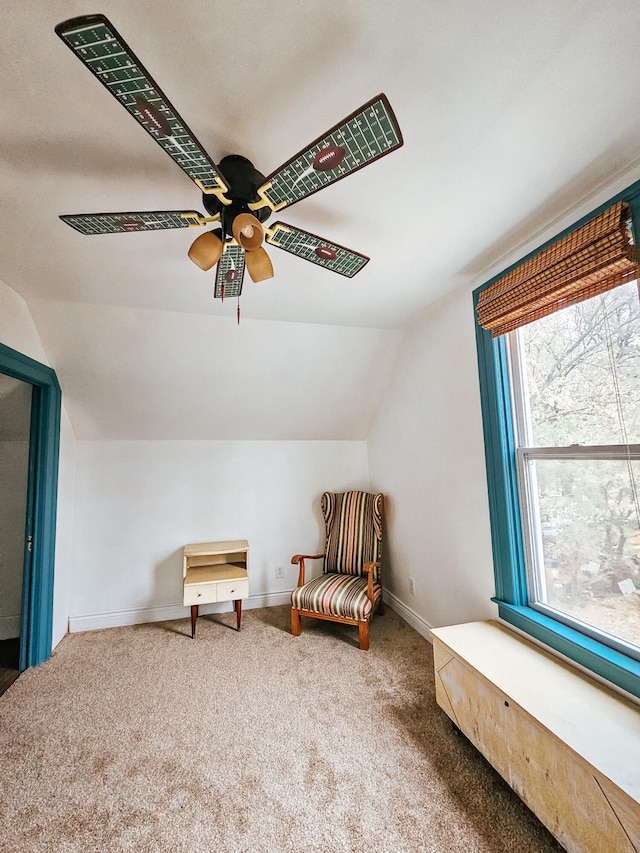 unfurnished room with vaulted ceiling, carpet flooring, and ceiling fan