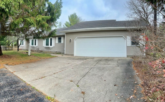 single story home with a garage