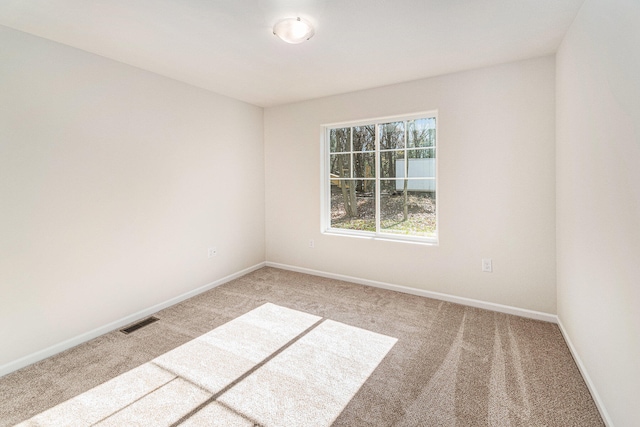 spare room with carpet flooring